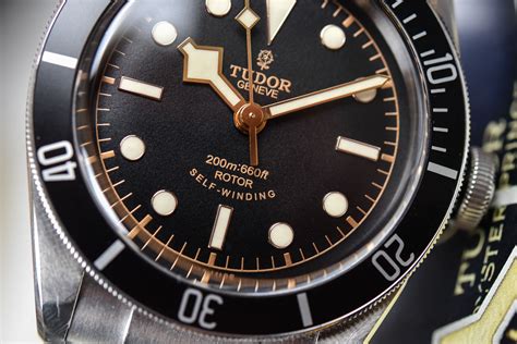 tudor black bay smiley face.